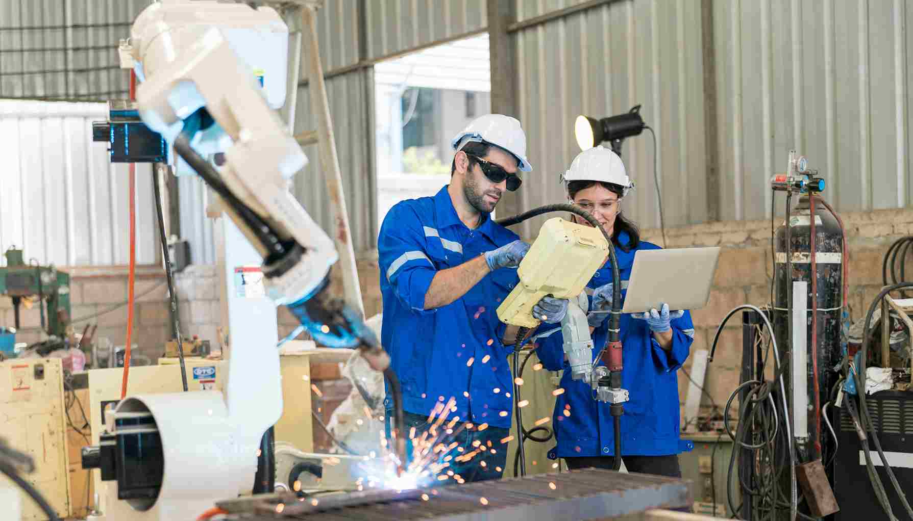 two-manufacturing-staffs-working-togather