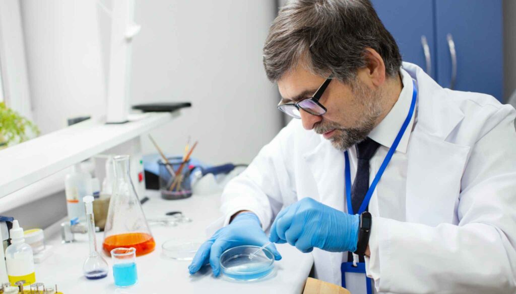 A lab tech is testing the chemical sample
