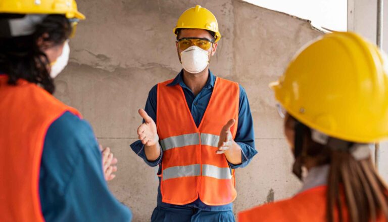 manager explaining importance of health & safety management system
